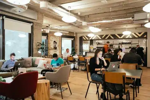7 Benefits of Coworking Spaces 6 people working